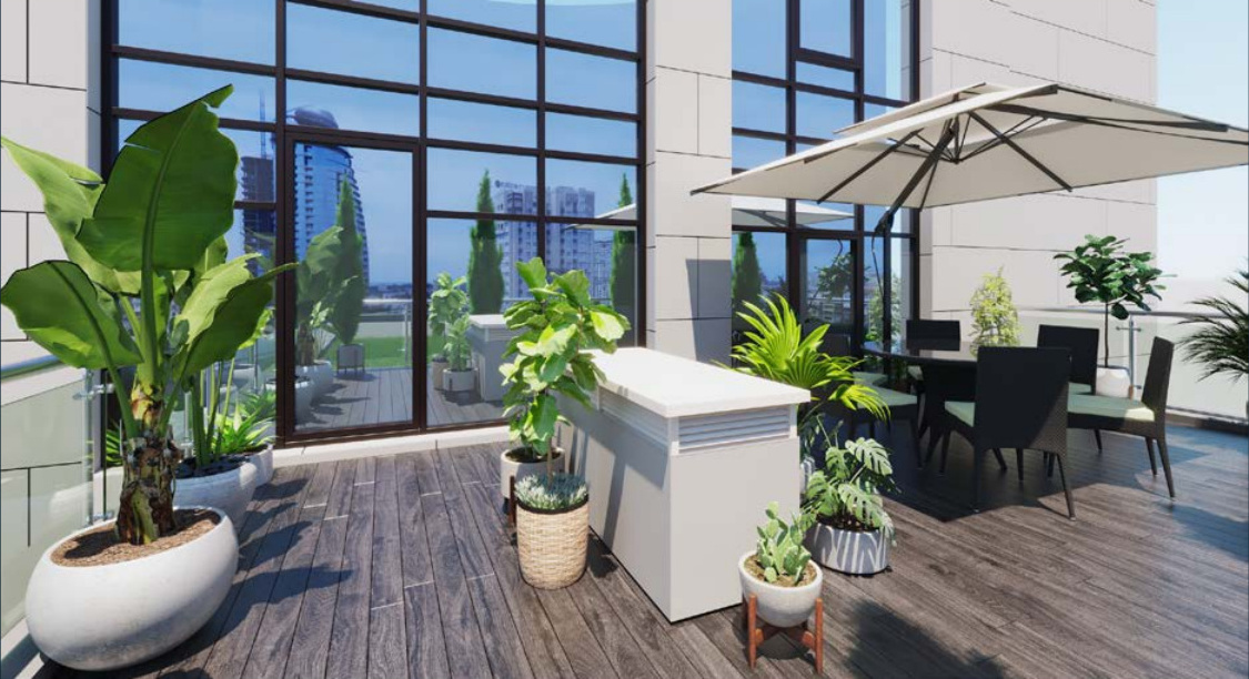 Gestaltete Terrasse eines Wohnprojekts